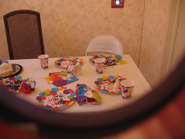 Inside another Model Home are the remains of a birthday party. I'm guessing the kids went outside to play...