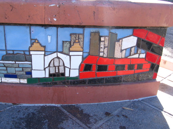 This small tile mosaic scene features a red trolley in front of downtown's Santa Fe Depot.