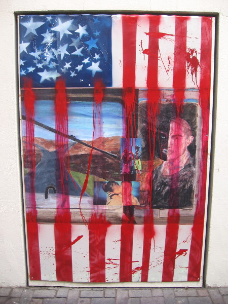 Smears of red, a flag, two faces.