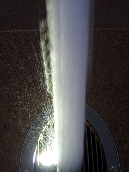 Jetting water lit brightly from beneath. Looks like sparklers!