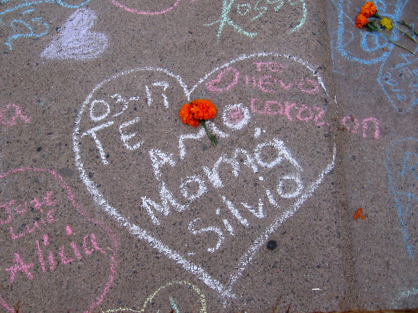 Te amo--I love you--and a marigold.