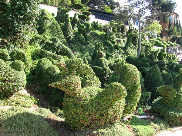 Harper's Topiary Garden seems to be a combination of a vegetable Noah's Ark and an army of unearthly creatures paralyzed by magic.