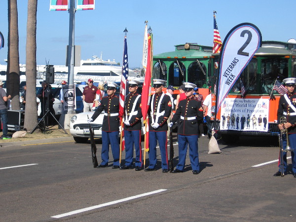 The color guard awaits the start of the big parade down Harbor Drive.