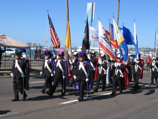 The San Diego Diocese Chapter of Knights of Columbus marches past.