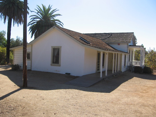 A simple adobe house, typical of the early American era, shortly after California had achieved statehood.