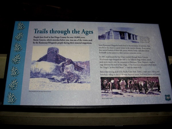 Sign at the overlook explains Trails Through the Ages. Storm Canyon below was used by the Native American Kumeyaay for thousands of years for seasonal migrations.