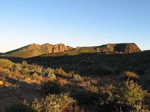 Garnet Peak, on the left, rises into the morning sunlight. A short trail leads to its summit from the Pacific Crest Trail.