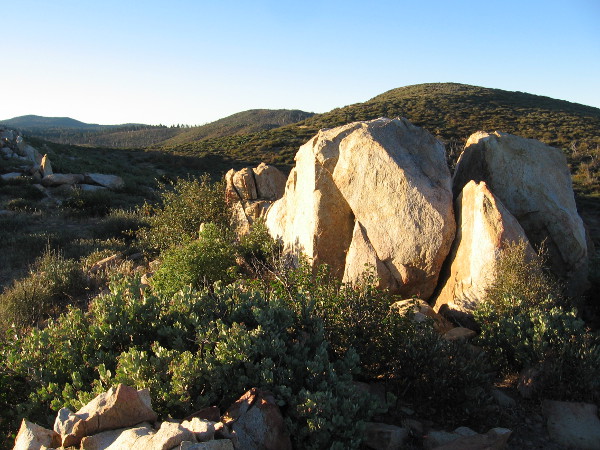 Looking south, bright light on a broken boulder.