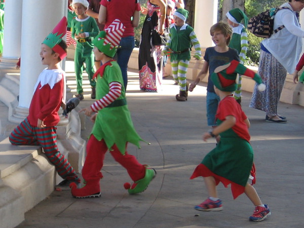 Numerous elves show up at the Spreckels Organ Pavilion during 2017 Christmas on the Prado.