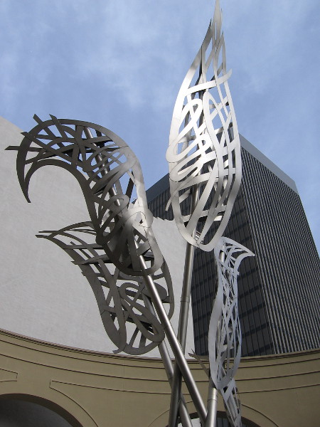 A sculpture titled Flame Flower stands in front of the Westin Gaslamp. Years ago, an obelisk once rose here--5 or 6 or 7 years ago. I can't remember exactly.