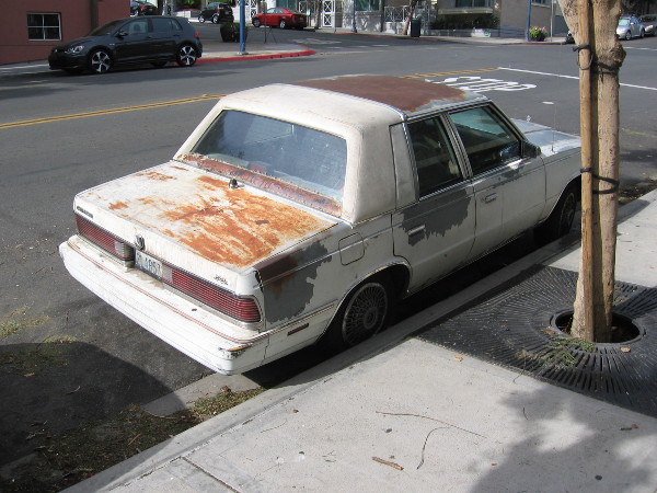 A once fashionable and new car turns to rust.