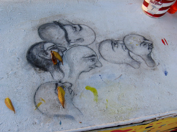 Many faces among leaves. Art discovered on Spanish Village's outdoor Studio 10 work table.