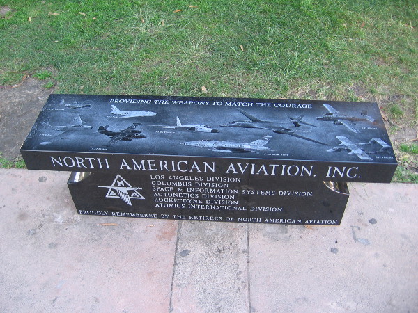 I was told that two new marble benches outside the entrance of the San Diego Air and Space Museum are about one month old. They were donated by North American Aviation, Inc.