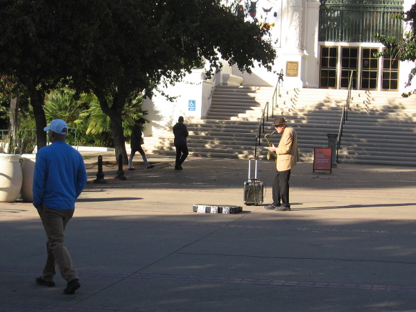 Filling the air with living music in front of the San Diego Natural History Museum.