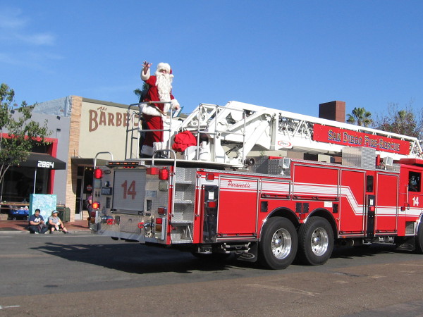 And at the end of the North Park Toyland Parade, good old Santa Claus waves to everyone from atop a fire engine! Merry Christmas!
