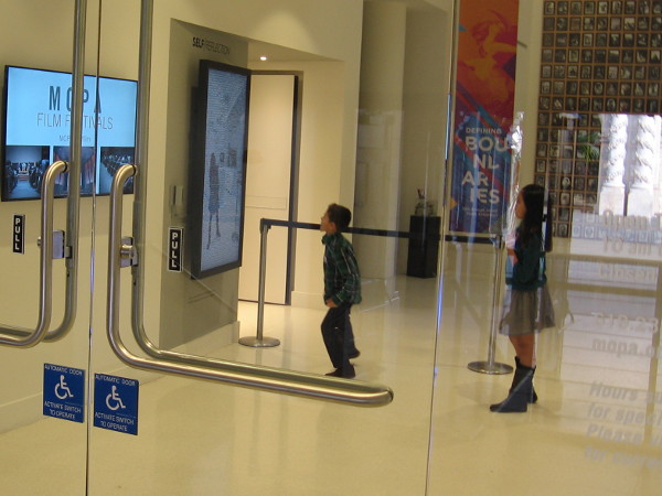 Youthful excitement inside the Museum of Photographic Arts.