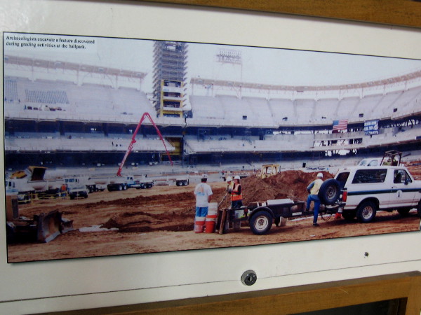 Photo taken during construction of Petco Park baseball stadium in East Village. Archaeologists excavate a feature discovered during grading activities at the ballpark.