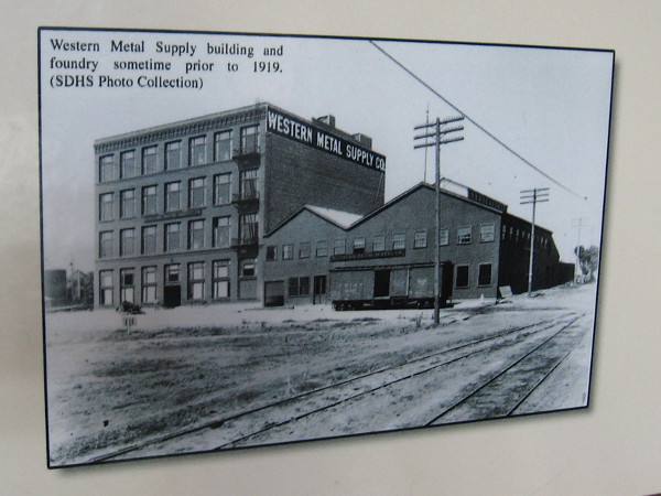 Old photo of Western Metal Supply building and foundry sometime prior to 1919. The preserved brick building is now a unique part Petco Park's structure.