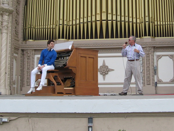 After a great organ rendition of Bohemian Rhapsody, Spreckels Organ Society's Executive Director Ross Porter announces kids are needed for the next number.