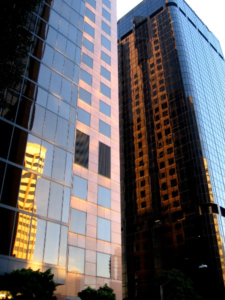 Almost to B Street. Some cool reflections produced by the early sunlight.