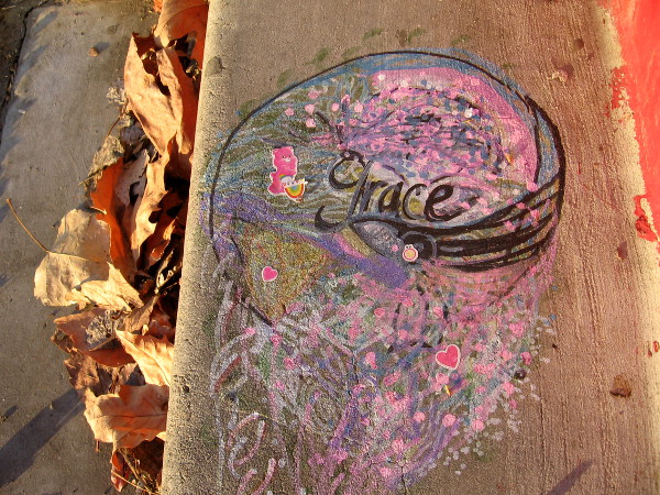 Grace, on a step among leaves.