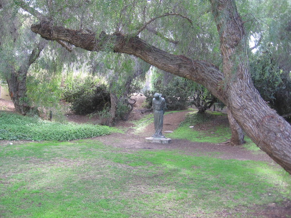 The Padre stands alone in a green, gentle place.