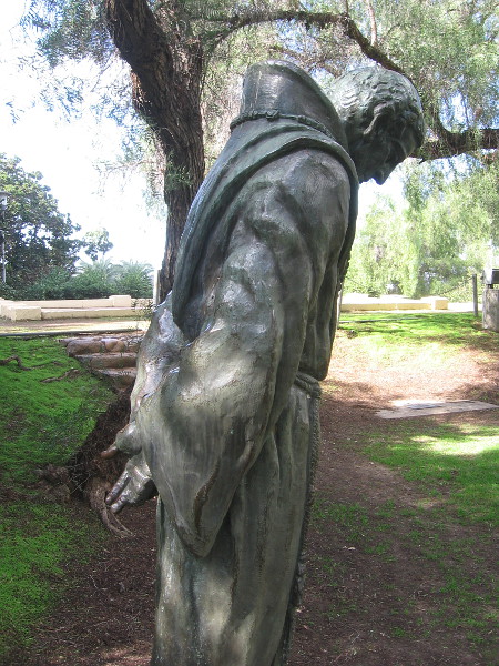 A quiet bronze statue among trees near San Diego's now ruined and vanished Presidio.