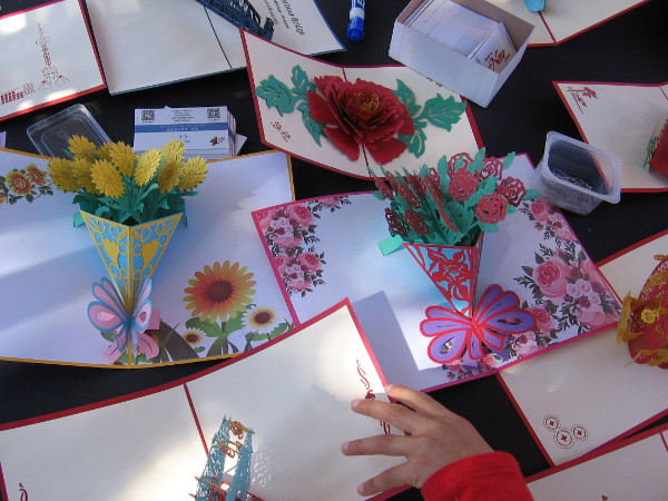 I spotted one table with clever cards that open to colorful pop-up bouquets.