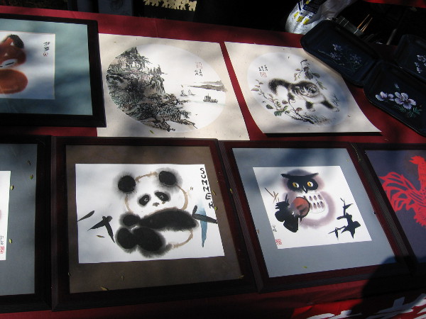 Some beautiful Chinese brush art and ink drawings were being displayed by friendly local artists.