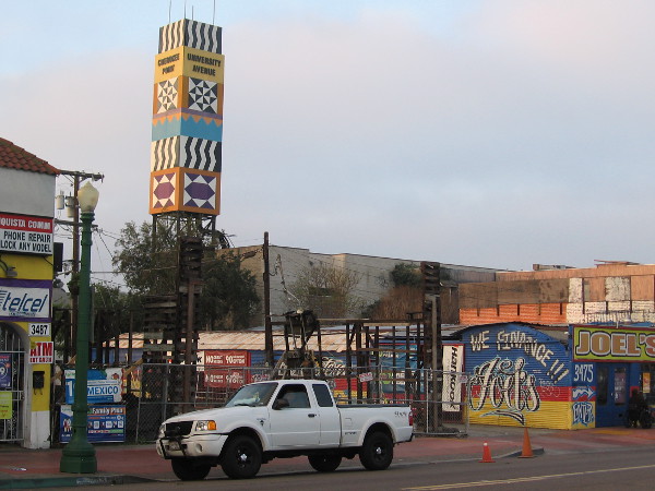 I've crossed the street and am heading back west. I noticed this colorful tower to the south features references to both City Heights and Cherokee Point, a neighborhood south of University Avenue.