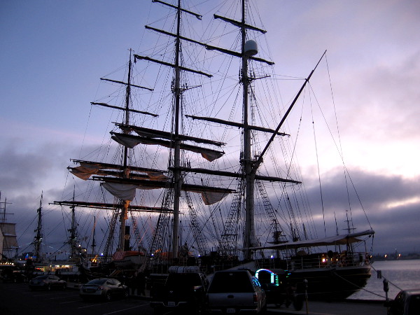 Evening photo of the beautiful tall ship Stad Amsterdam docked on San Diego's Embarcadero.