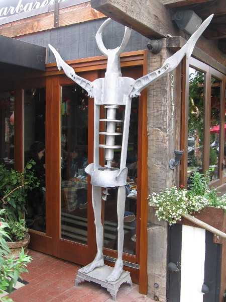 Barbarella Restaurant and Bar has a huge wing corkscrew sculpture with human feet!