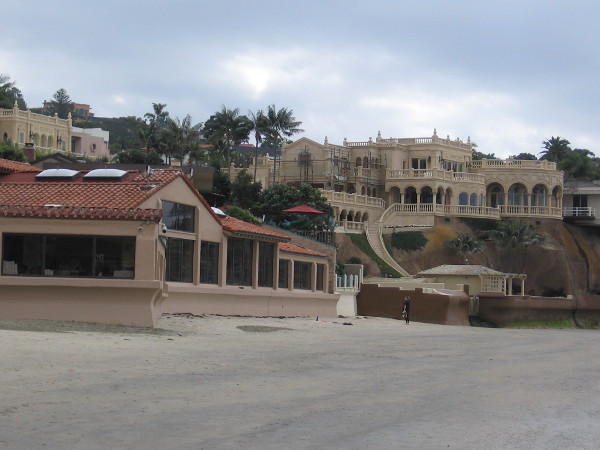 The Marine Room is on the left. At high tide, crashing waves come right up to the windows of this elegant restaurant with a stunning ocean view.