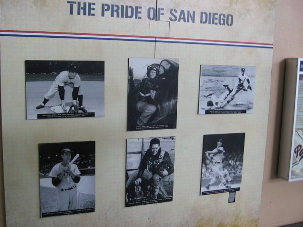 Historical photographs in Petco Park honor The Pride of San Diego. Two legendary Padres players, Ted Williams and Jerry Coleman, are shown on the baseball diamond and serving as pilots during the Korean War.
