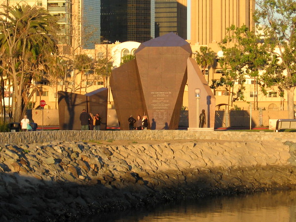 The U.S.S. San Diego Memorial attracts walkers. Another day is nearing an end on San Diego's Embarcadero.