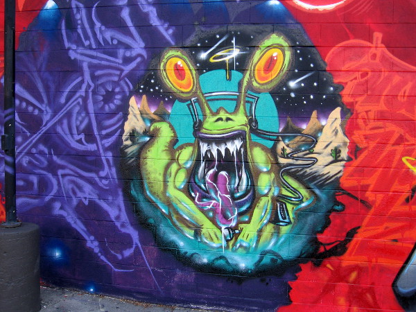 Looks to me like a cross between an evil green Jar Jar Binks and a toothy Alien or Venom.