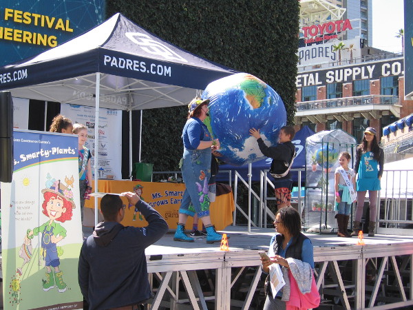 How does the Earth stay in orbit. How can people help the Earth stay healthy.