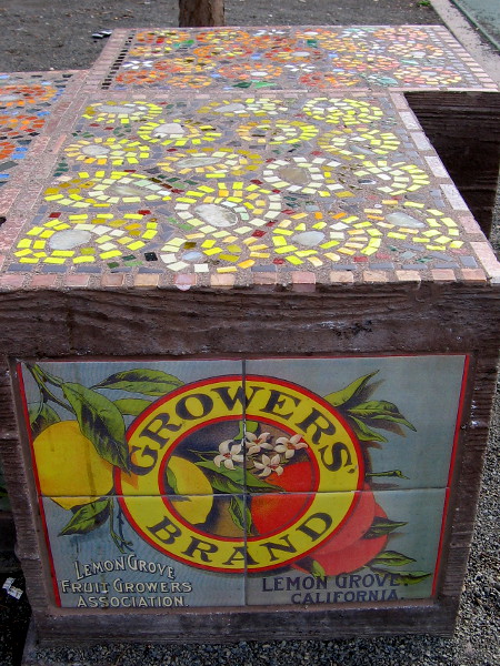 A nearby bench in the park appears like a crate once used by the Lemon Grove Fruit Growers Association!