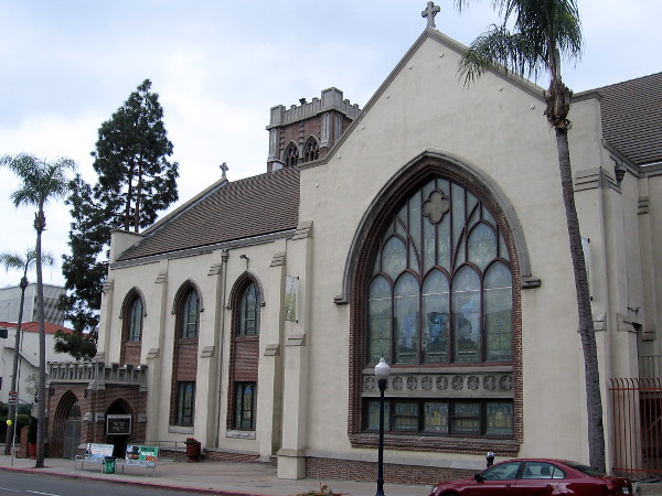 View of the First Presbyterian Church of San Diego from Fourth Avenue. The stained glass window shines its light into a very beautiful sanctuary.