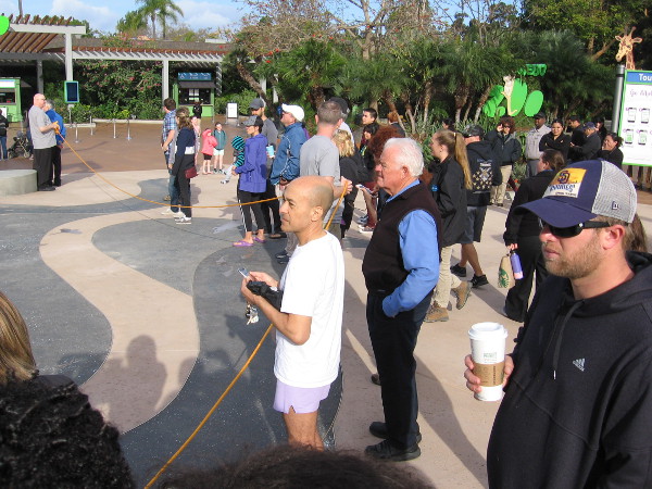 People wait for the historic event to begin.