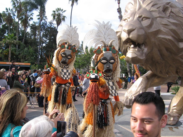 These cool costumed stilt-walkers circled around from the other side!