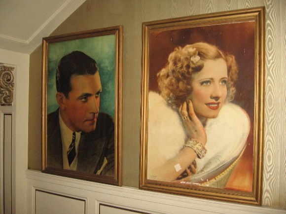 Portraits of Hollywood stars left of the front counter.