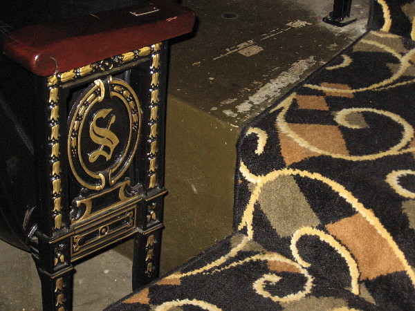 A distinctive Spreckels Theatre design at the end of every seat row.