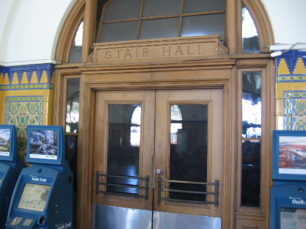 More woodwork around a door that leads to an old Stair Hall on the waiting room's east side.