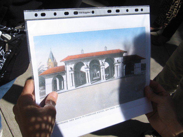 We are shown more old images. This is an illustration of the original arched forecourt structure on Broadway. I also see the tower of the original 1887 Victorian station to the west (the other side of the tracks) before it was demolished.