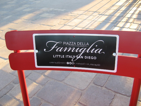 One of many seats at the tables in Piazza della Famiglia.
