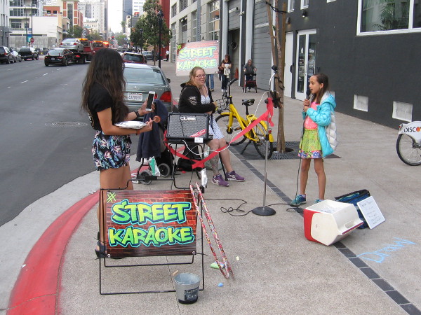 Some folks were singing their hearts out doing Street Karaoke.