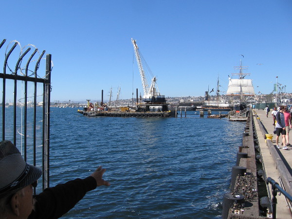 My friend Carlos points out this fascinating activity on the bayfront. I see the Star of India and the Maritime Museum of San Diego in the distance.