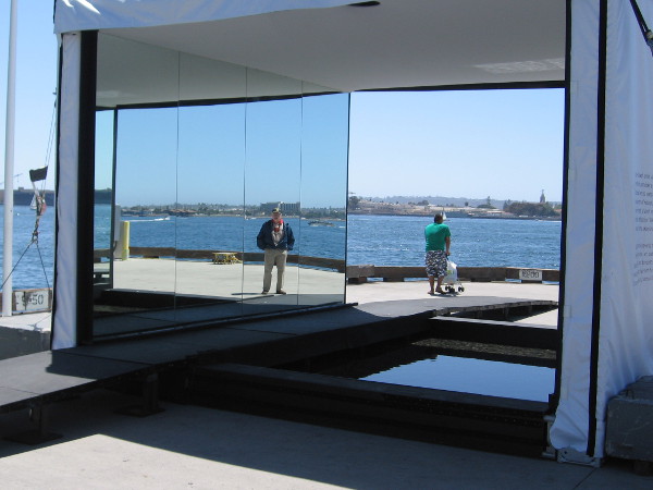 A mirror in the world, and a world in the mirror.