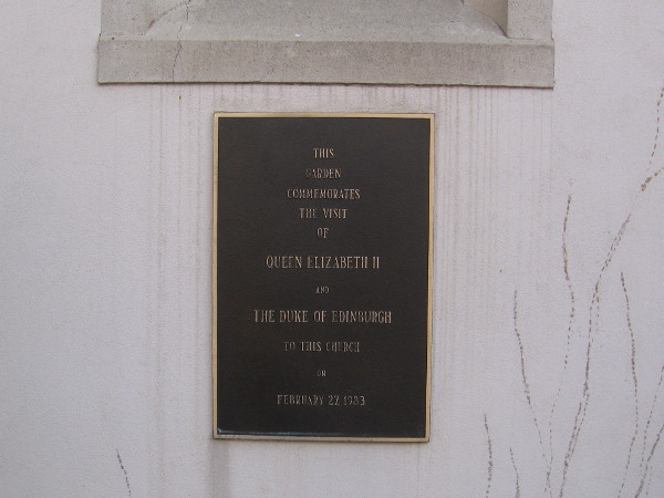 A plaque in the courtyard area between the Great Hall and cathedral. This garden commemorates the visit of Queen Elizabeth II and the Duke of Edinburgh to this church on February 27, 1983.